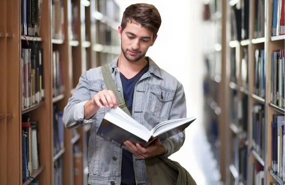 student reading book